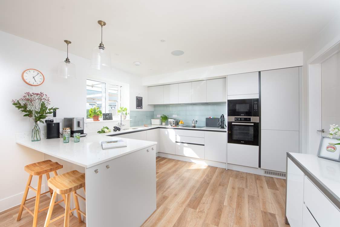 The stylish kitchen is the perfect space for cooking up a feast.