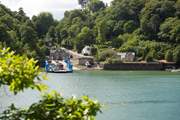 Why not venture further afield to the Roseland via the King Harry Ferry? 