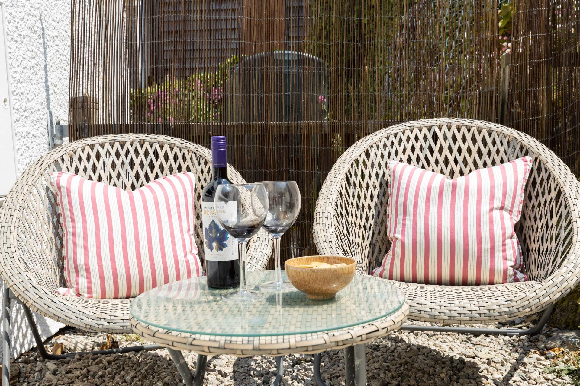 The rear courtyard has a secluded terrace .