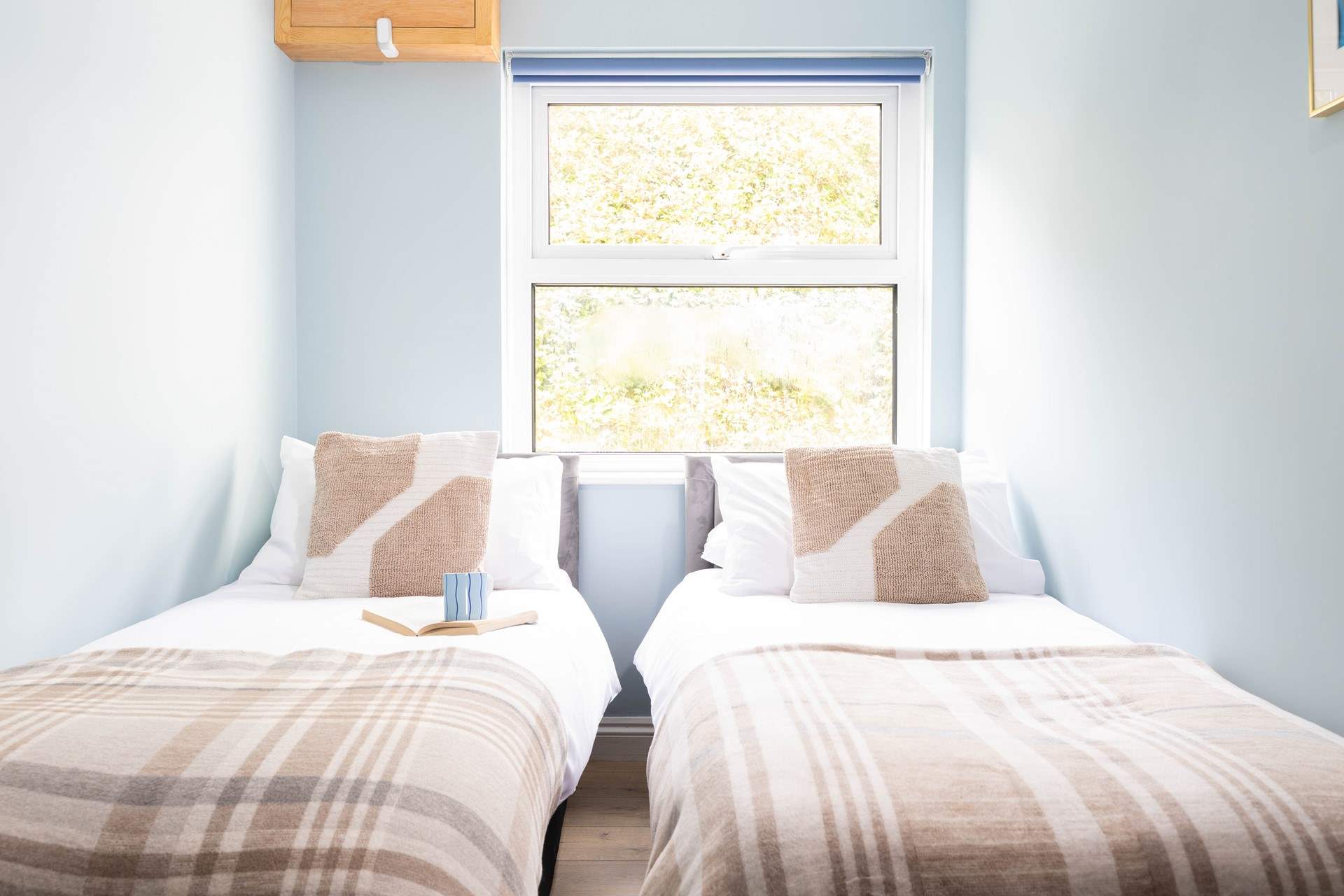 Bedroom 2 has cosy twin beds (2'6