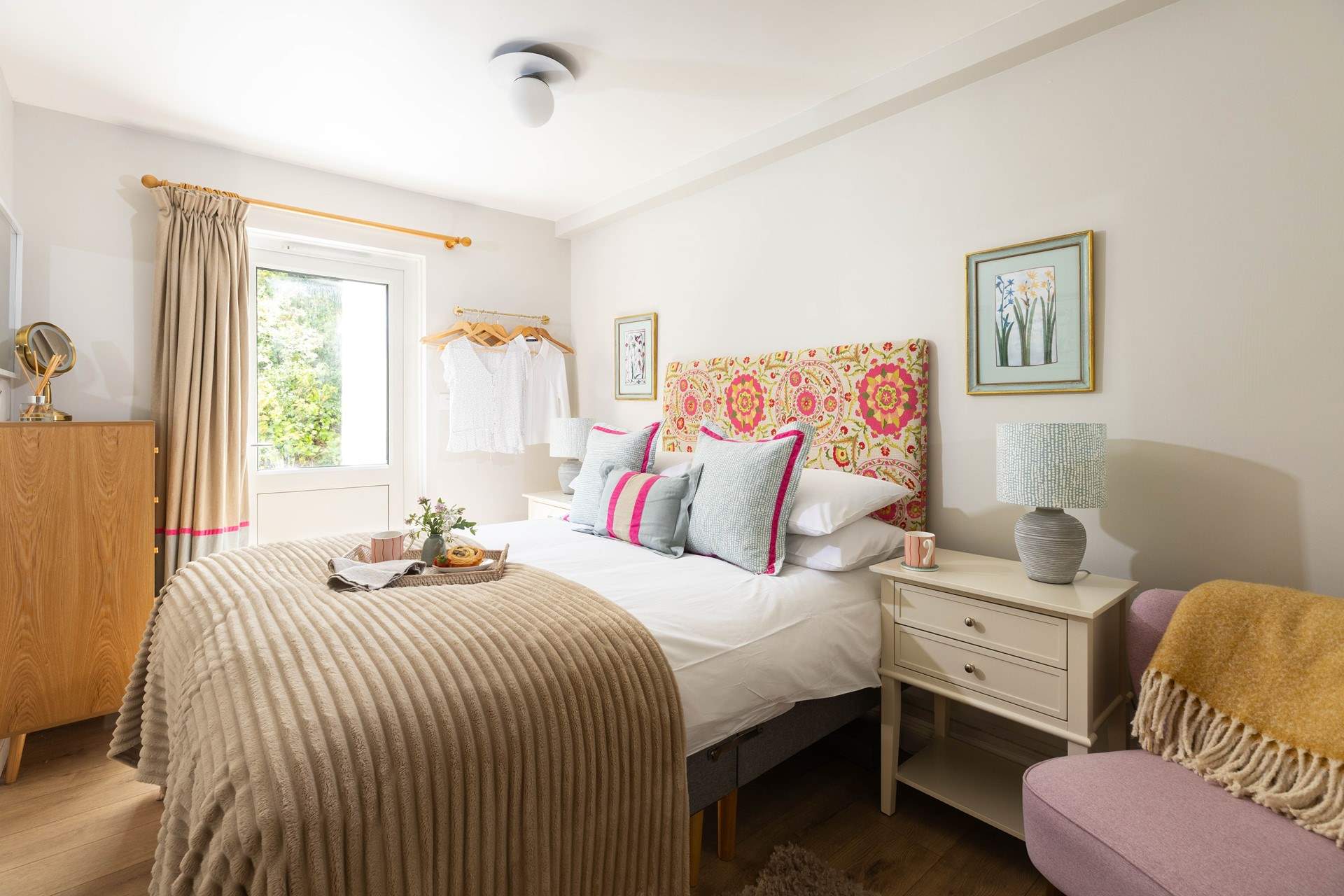 Bedroom 1 has a double bed and access to the rear courtyard. 