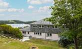 The view from the raised rear garden across to the bobbing boats beyond. - Thumbnail Image