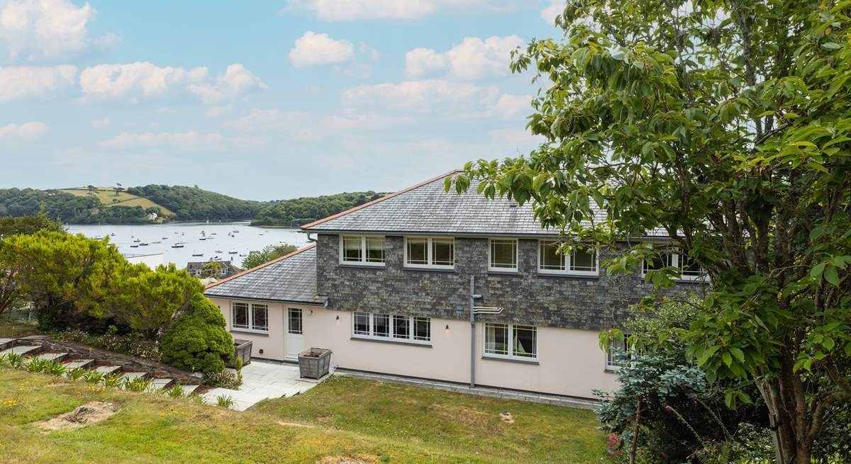 The view from the raised rear garden across to the bobbing boats beyond.