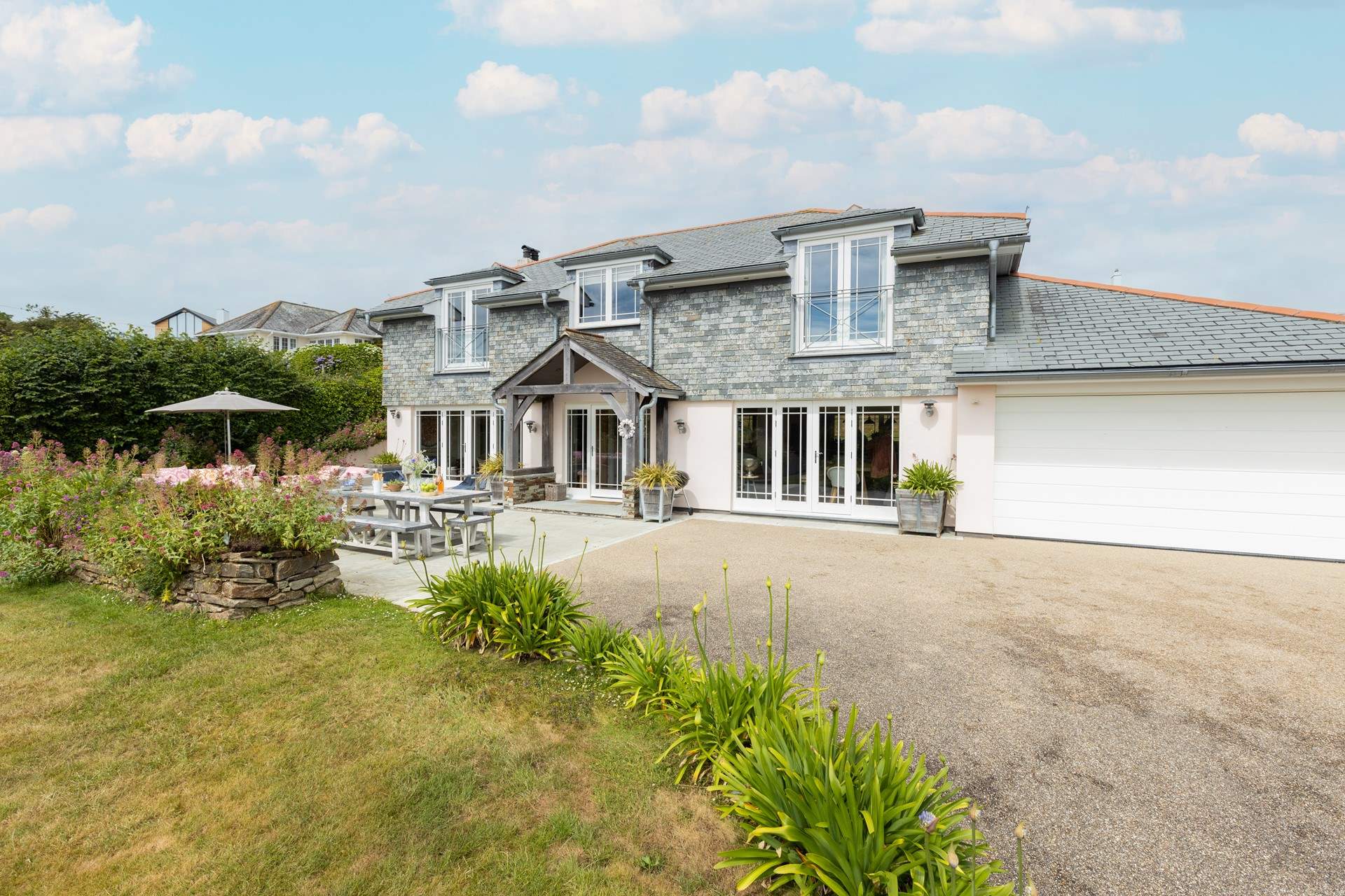 There is parking for two cars at the top of the drive.