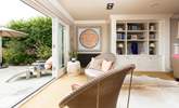 In summer open up the living space and let the outside in, what an amazing space to socialise with family and friends. - Thumbnail Image