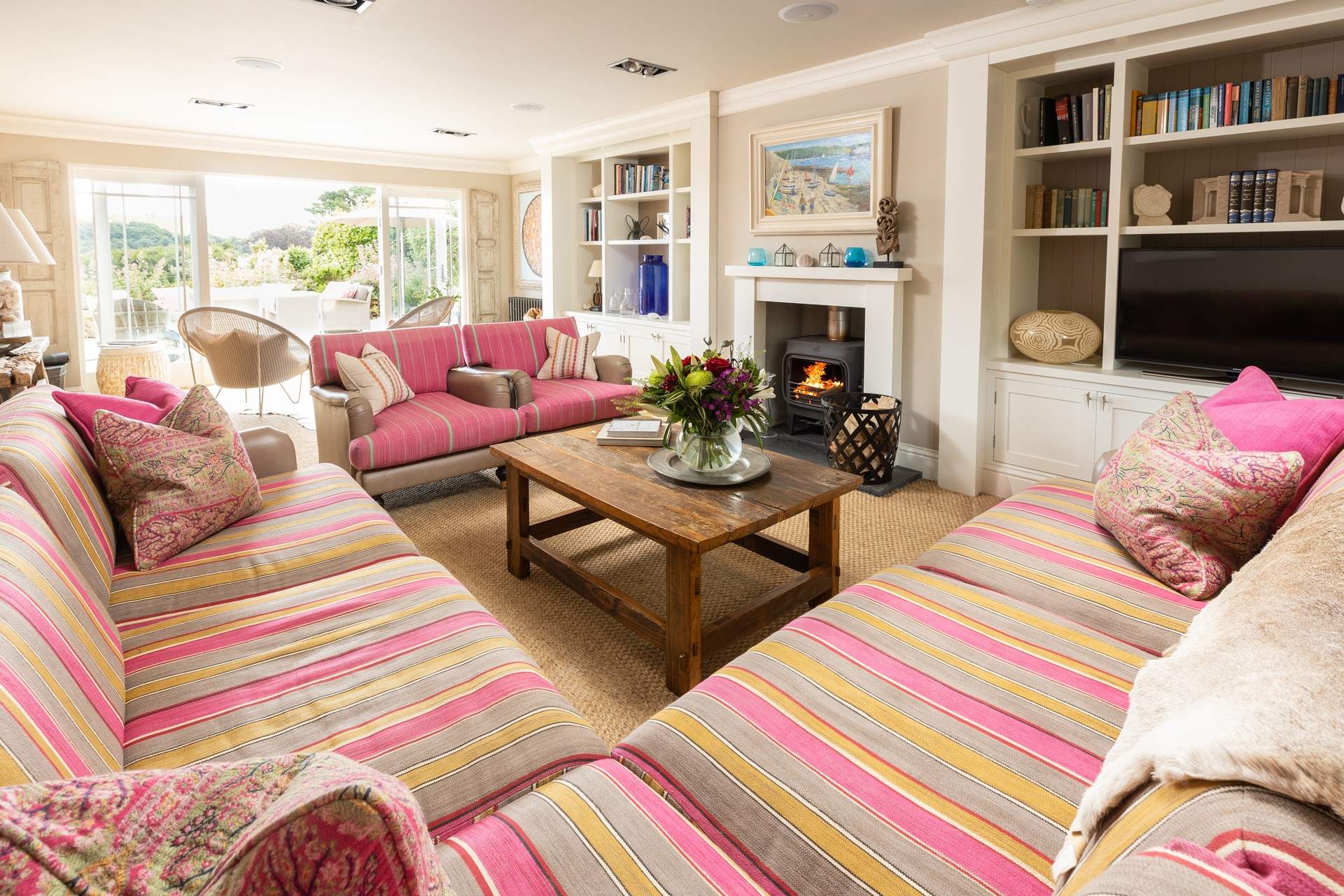 The gorgeous sitting-room with doors opening on to the terrace.