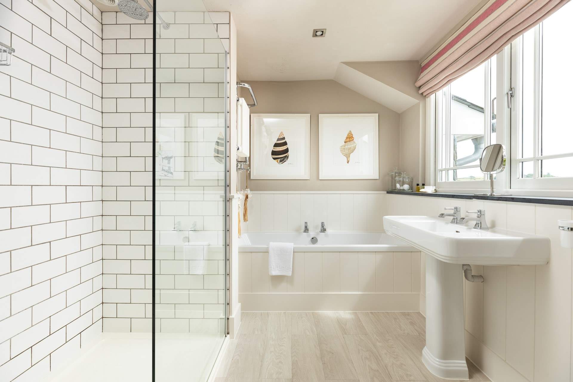 The en suite bathroom to bedroom 2 looks out over the front of the house so enjoys the views.