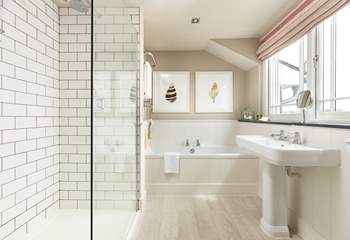 The en suite bathroom to bedroom 2 looks out over the front of the house so enjoys the views.