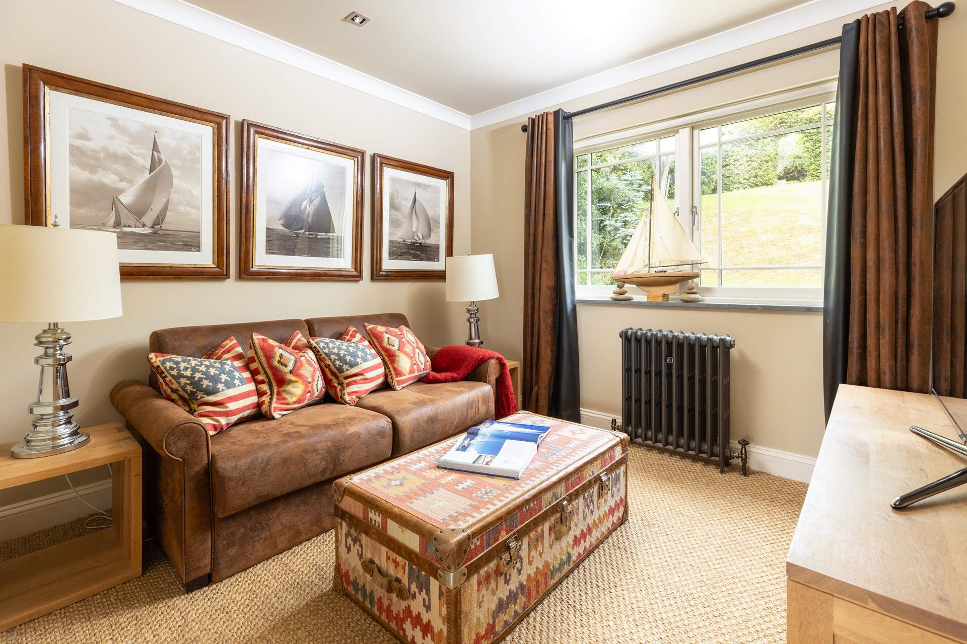 The snug is a quiet space to relax or watch a movie.