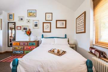 The bedroom is a welcoming retreat.