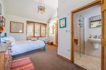 It has an en suite shower-room.