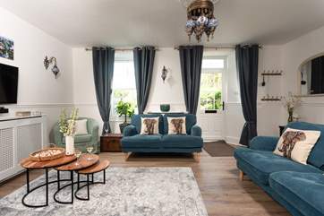 Discover the restful sitting-room you can easily imagine yourself unwinding here after a day exploring this special slice of Cornwall.