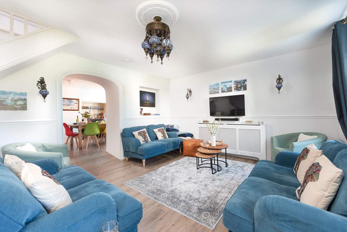 The sitting-room leads into the kitchen/diner.