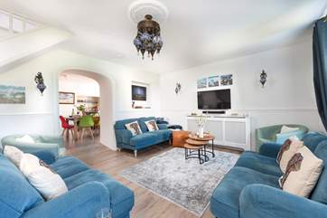 The sitting-room leads into the kitchen/diner.