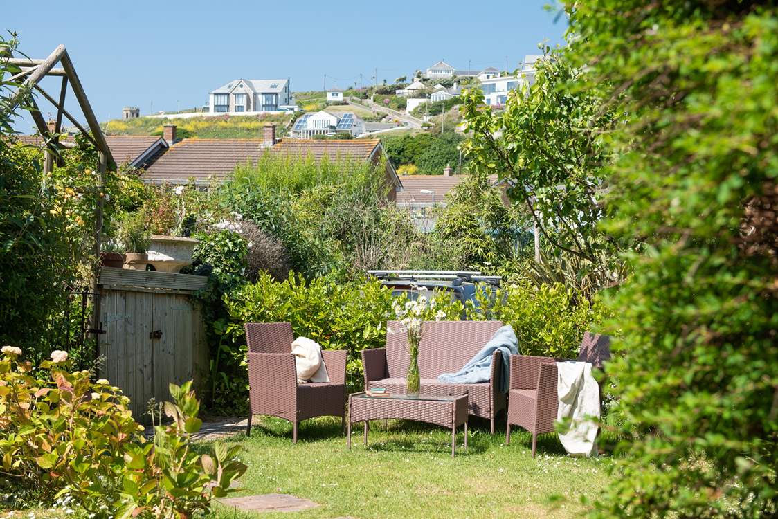 The garden is lovely and secluded. The parking is in front of the cottage.