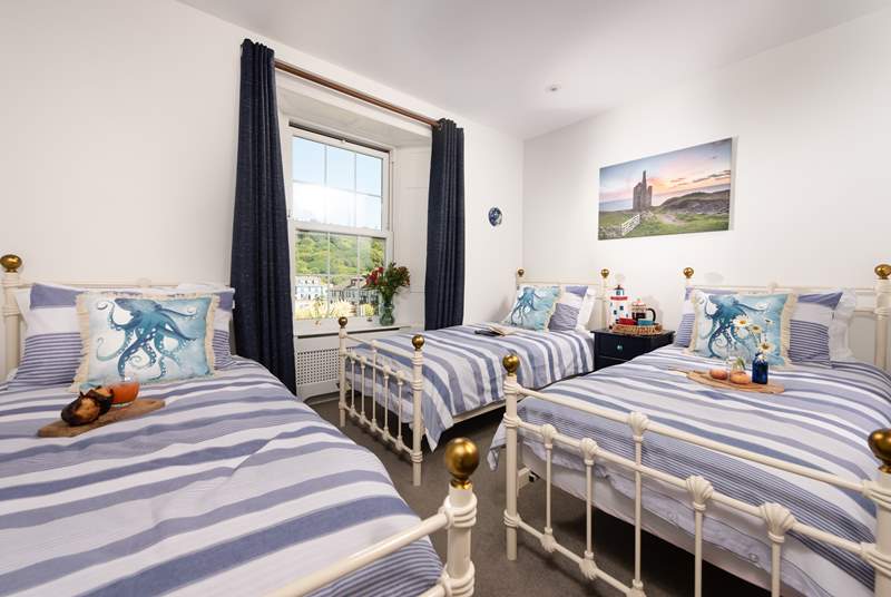 Bedroom three has three single beds perfect for our younger guests who would like to have a holiday sleepover, maybe with a midnight feast too.