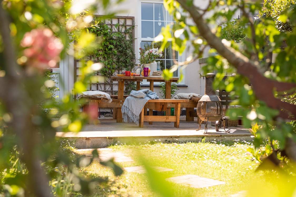 The garden is a real sun-trap. (Please note, the chiminea is no longer available).