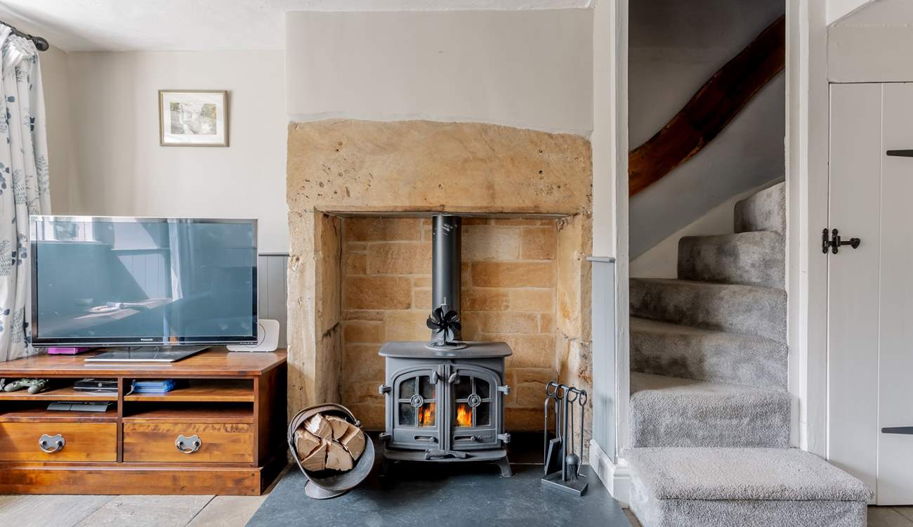 The traditional winding stairs lead to the bedrooms and bathroom.