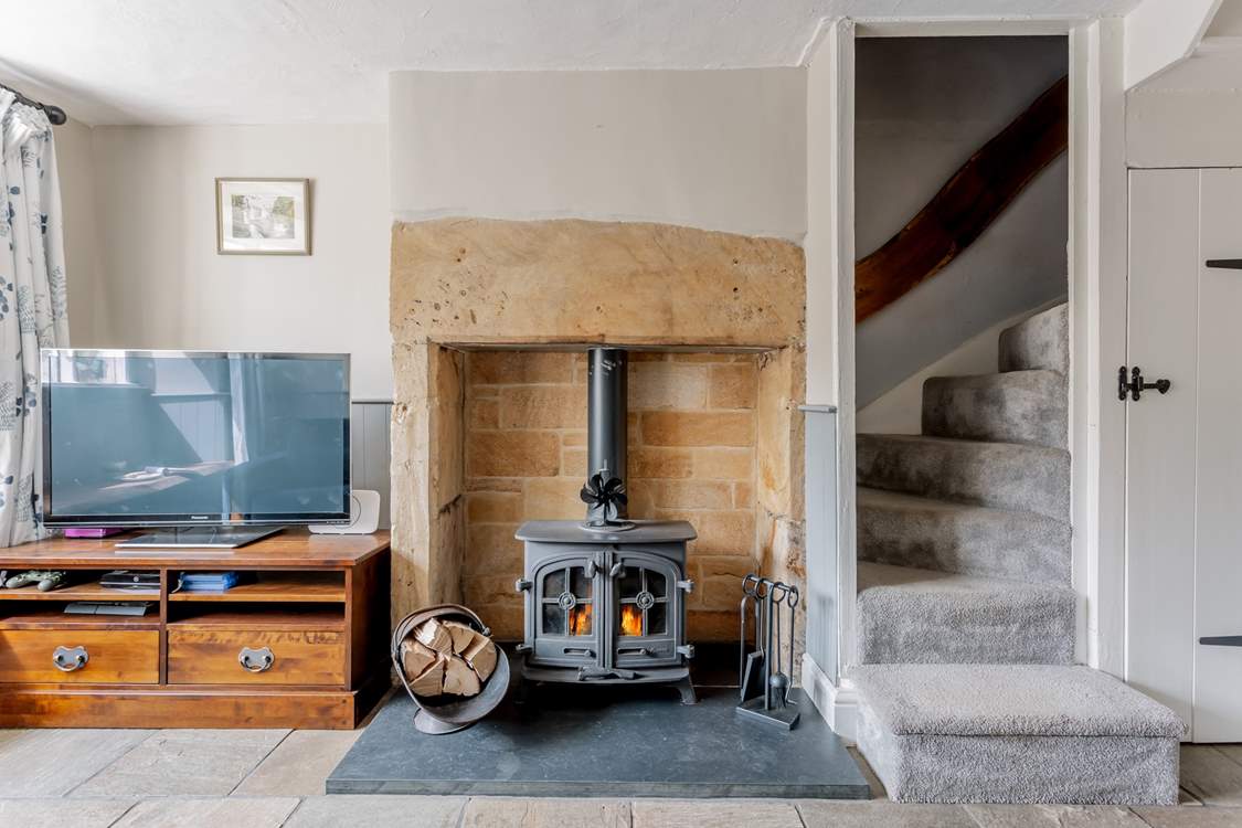 The traditional winding stairs lead to the bedrooms and bathroom.