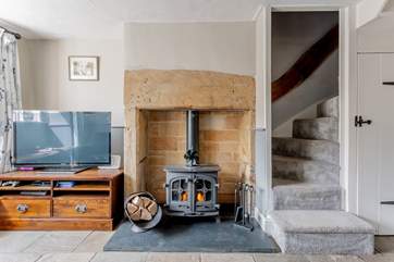 The traditional winding stairs lead to the bedrooms and bathroom.