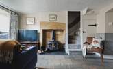 The roaring wood-burner and feature fireplace is a delight. - Thumbnail Image