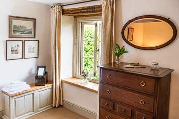 Enjoy views of the garden from the bedroom window.