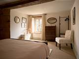 The bedroom is styled to perfection with plenty of storage