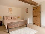 The bedroom is a peaceful space and overlooks the garden