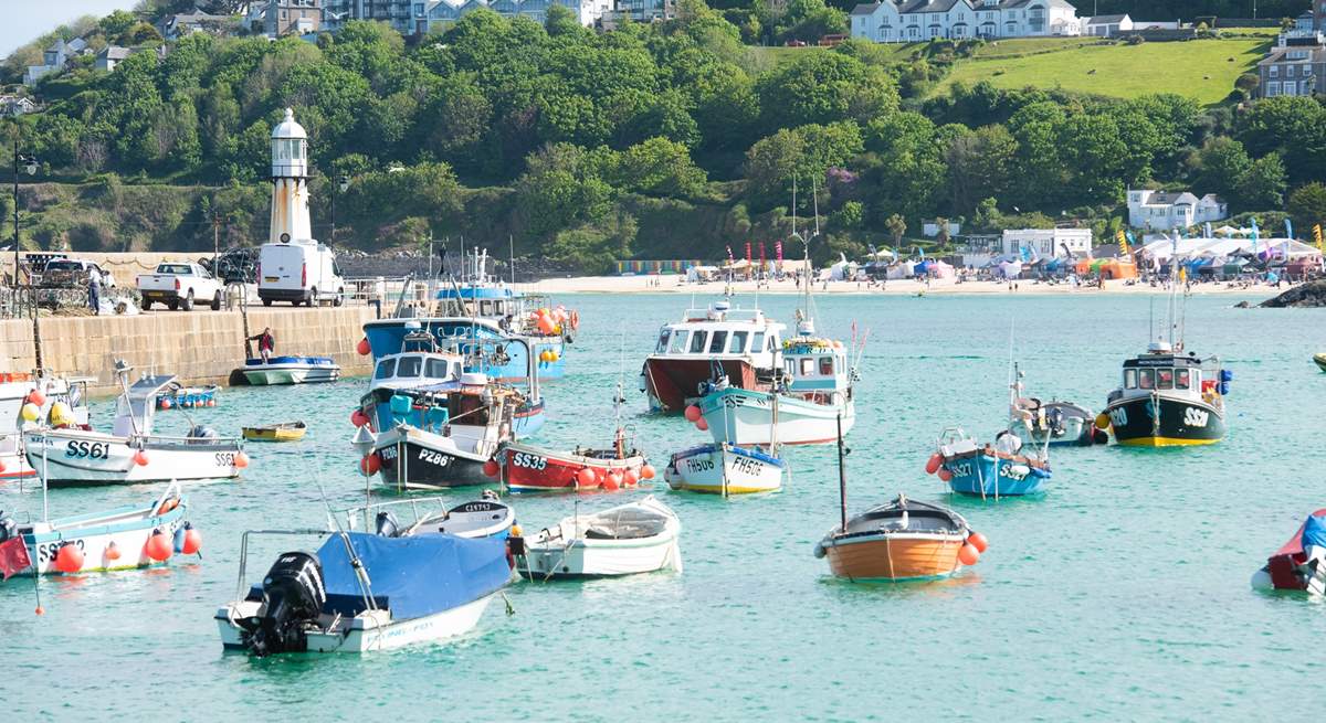 Boats bob gently in the water at St Ives.