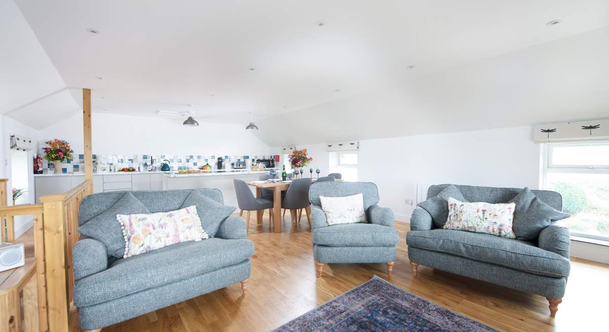 The open plan living area is spacious and full of light.