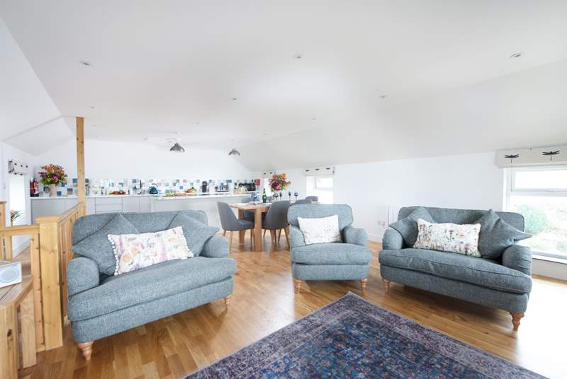 The open plan living area is spacious and full of light.