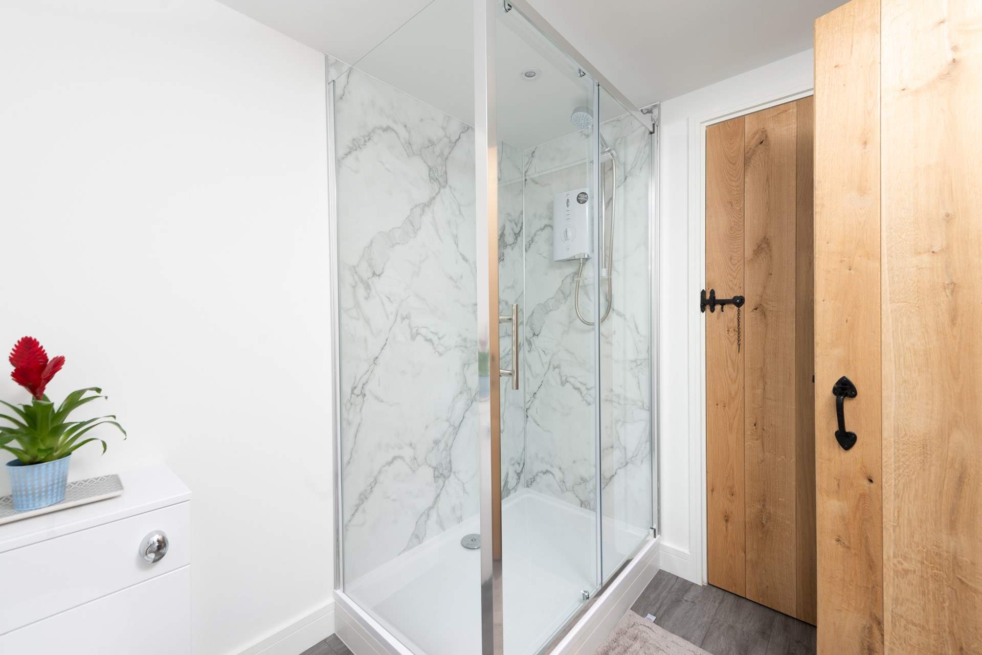 The enclosed shower is the perfect spot for washing muddy paws or sandy toes.