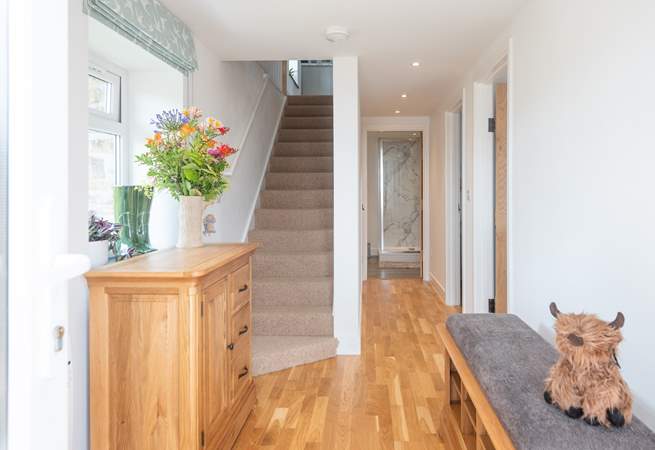 The lovely entrance hall. Stairs lead up to the open plan living area. 