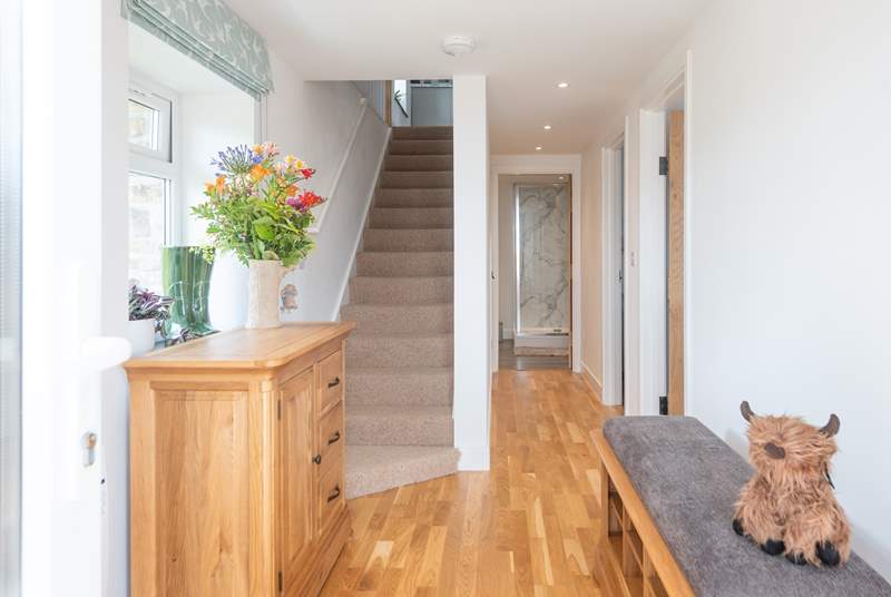 The lovely entrance hall. Stairs lead up to the open plan living area. 