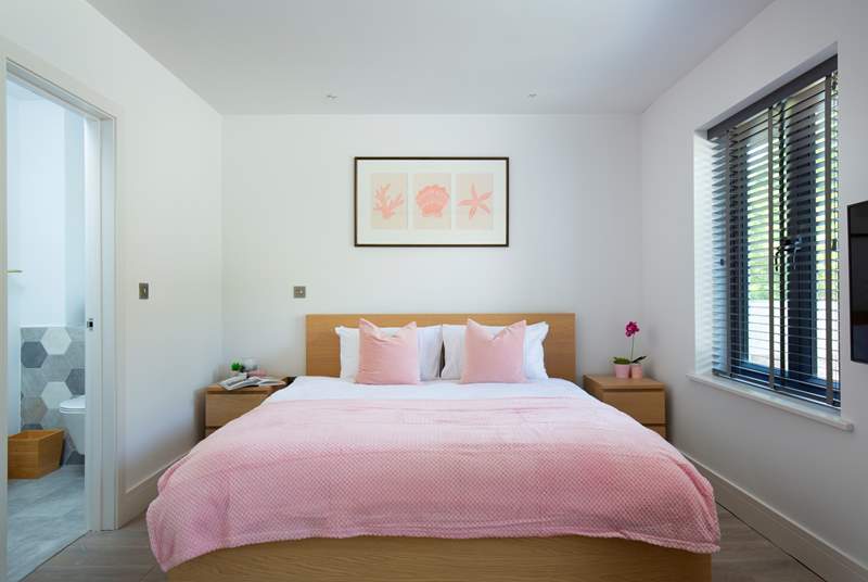 Bedroom two has a super-king size double bed and en suite shower-room.