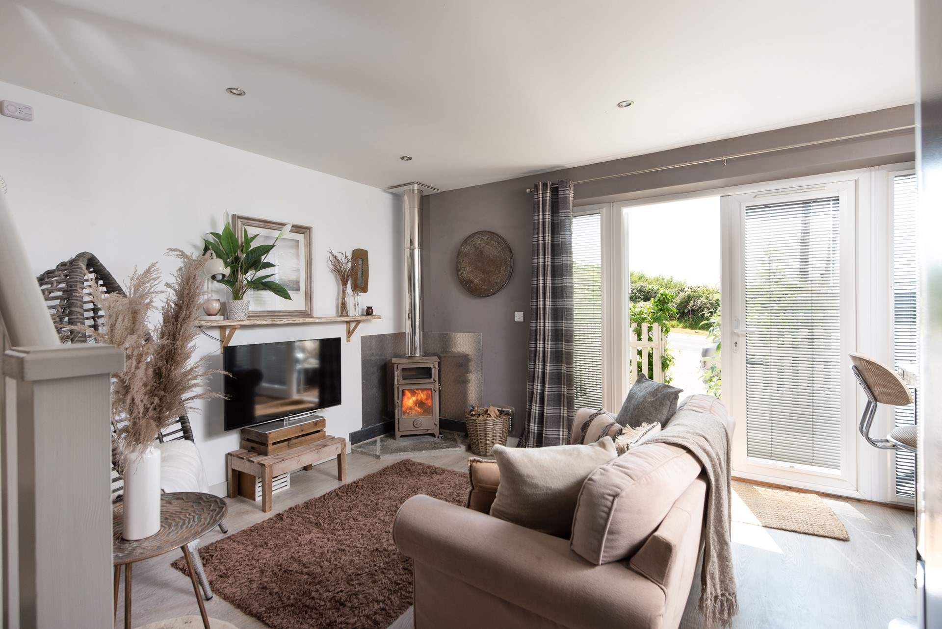 The lovely sitting area, with a gorgeous wood-burner. 