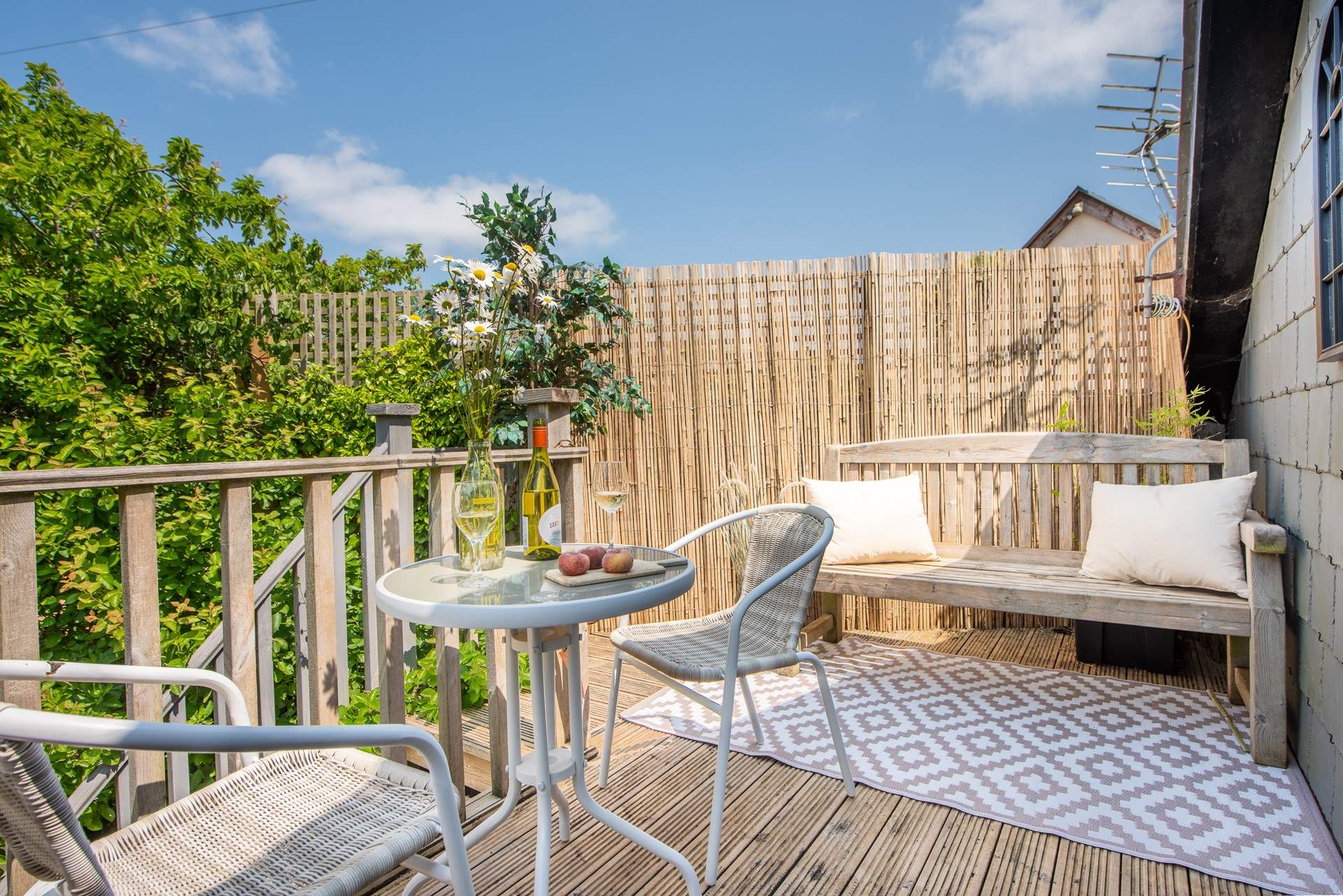 The balcony captures the afternoon sun.