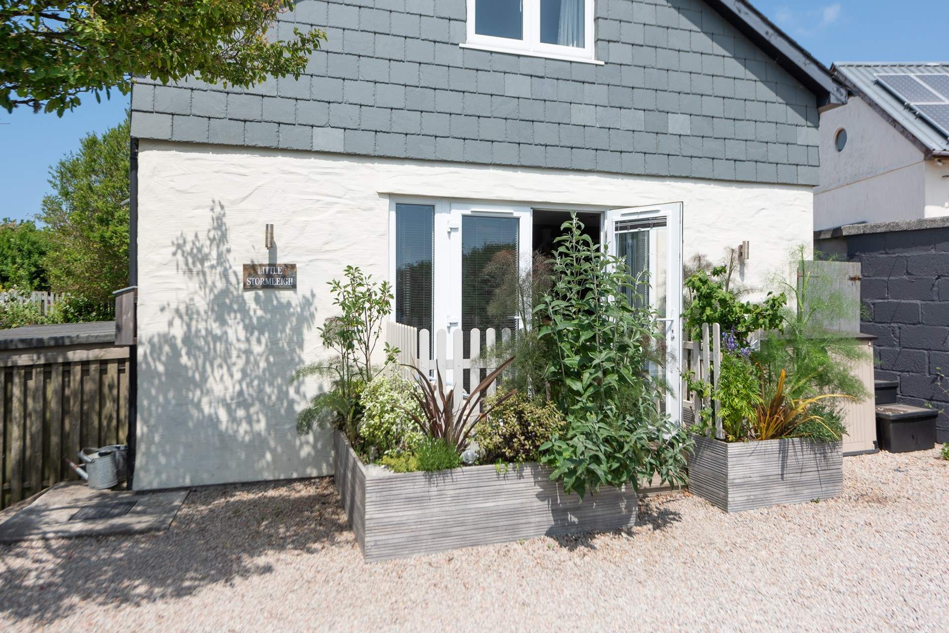 The pretty entrance to Little Stormleigh.