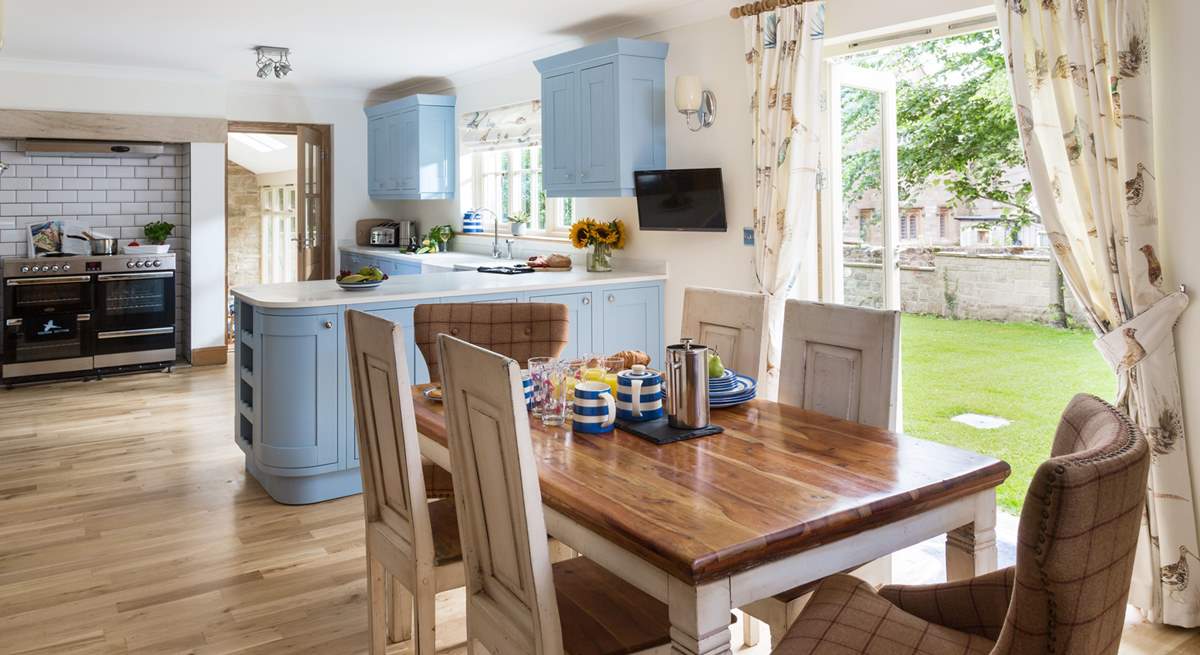 The kitchen/diner with French doors to the garden is a great place to get together.