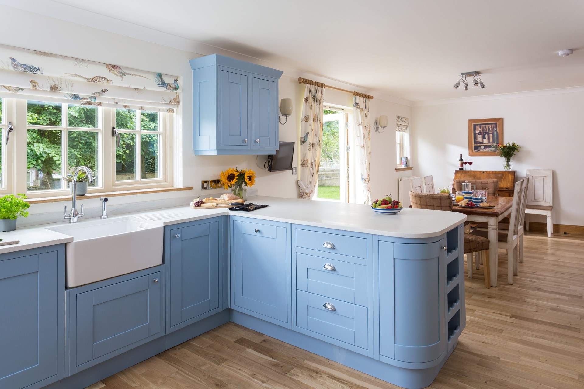 This fantastic country kitchen has plenty of space for preparing a meal.