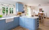 This fantastic country kitchen has plenty of space for preparing a meal. - Thumbnail Image