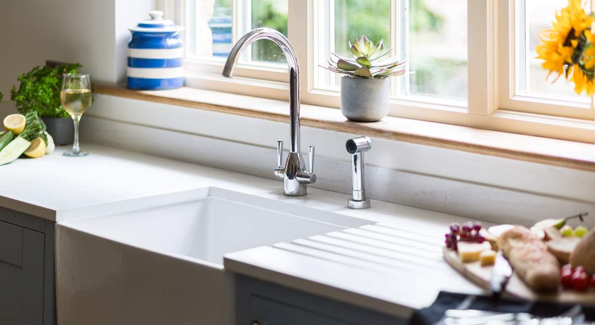 The Belfast sink lends a country feel to the kitchen.