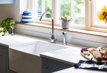 The Belfast sink lends a country feel to the kitchen.