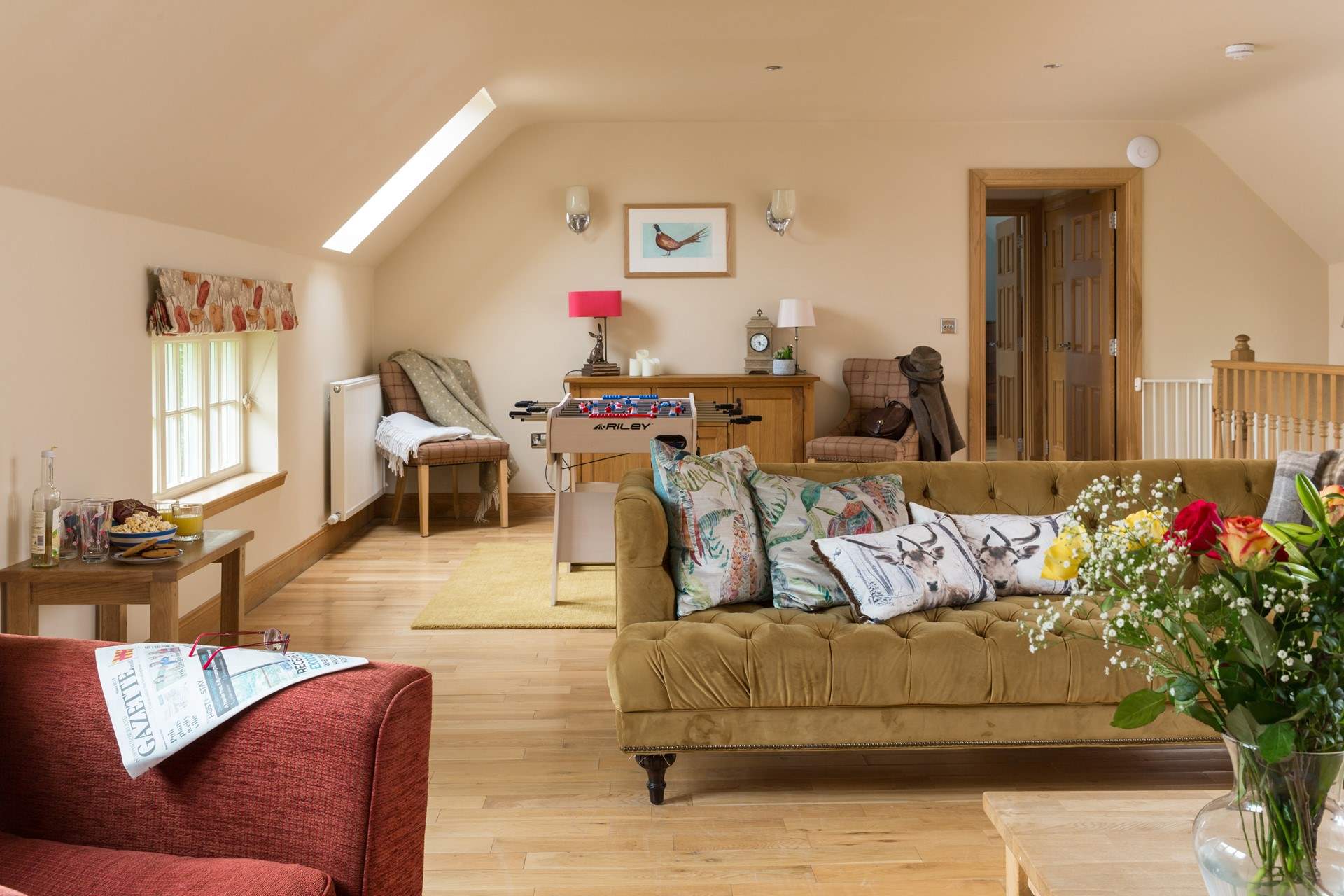 Relax in the first floor sitting/games-room which has views over the garden.