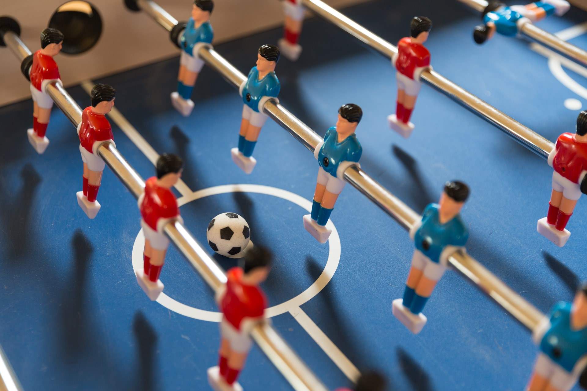 Challenge each other to a table football tournament.