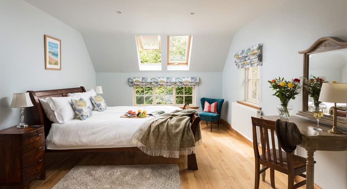 Fall asleep in this beautiful bedroom watching the stars through the windows in this 'Dark Skies' area.