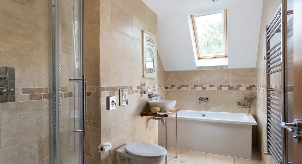 This sparkling bathroom is next to bedroom 3.