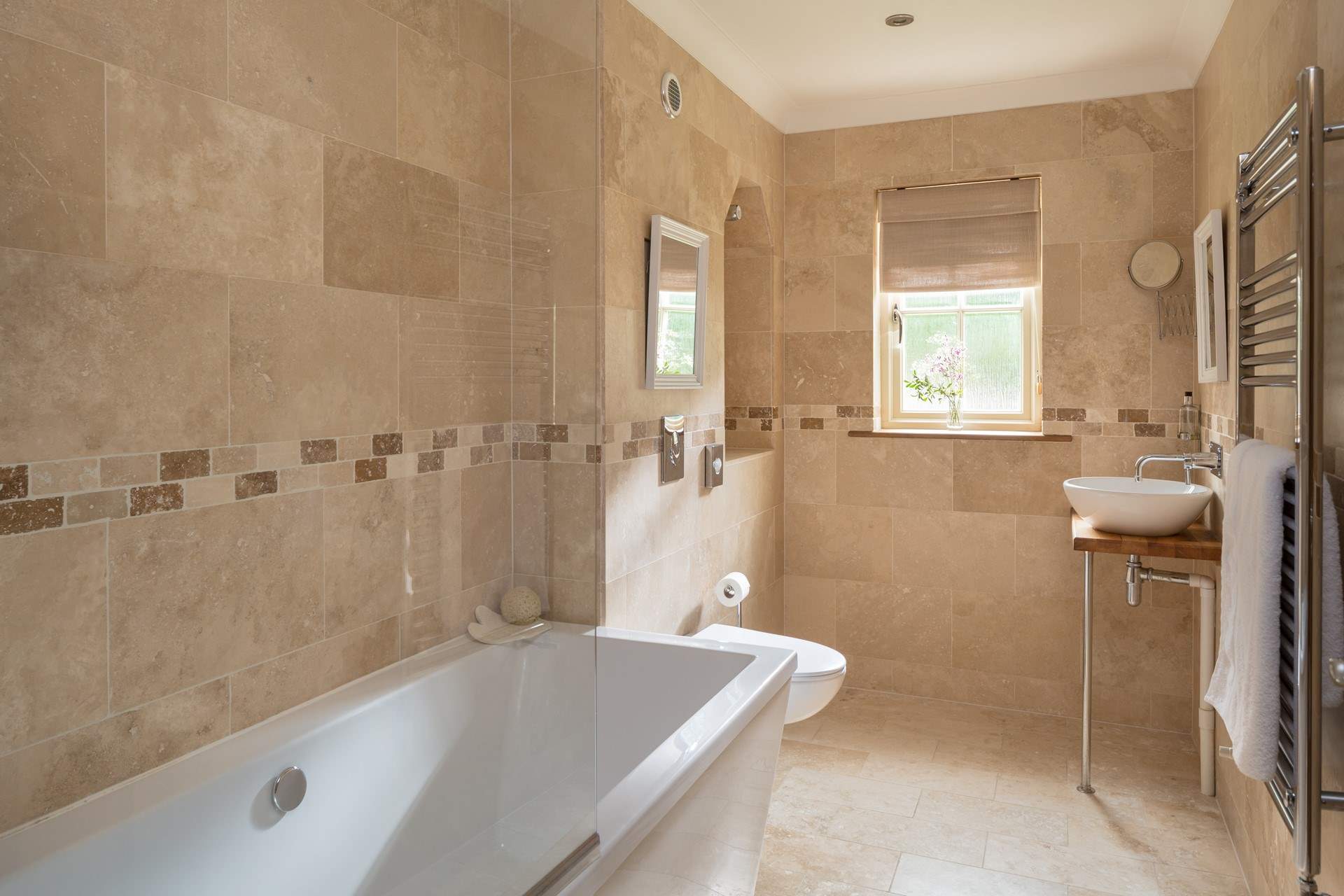 Take a soak in the bath after a day on the beach.