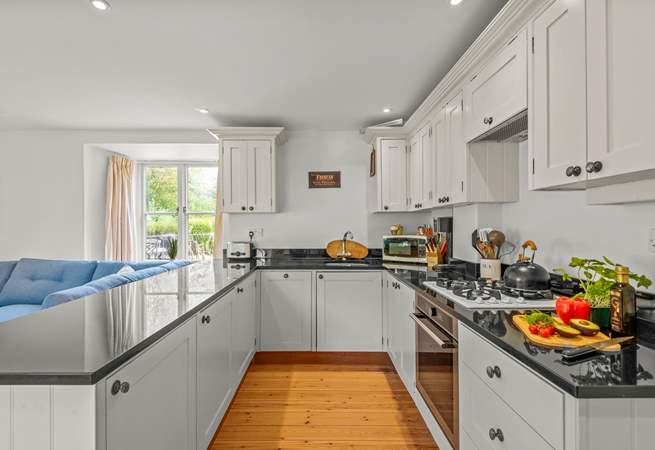 Fully equipped kitchen with oodles of space to whip up a feast.