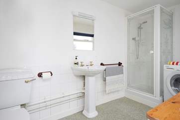 The ground floor shower-room with handy washing machine.